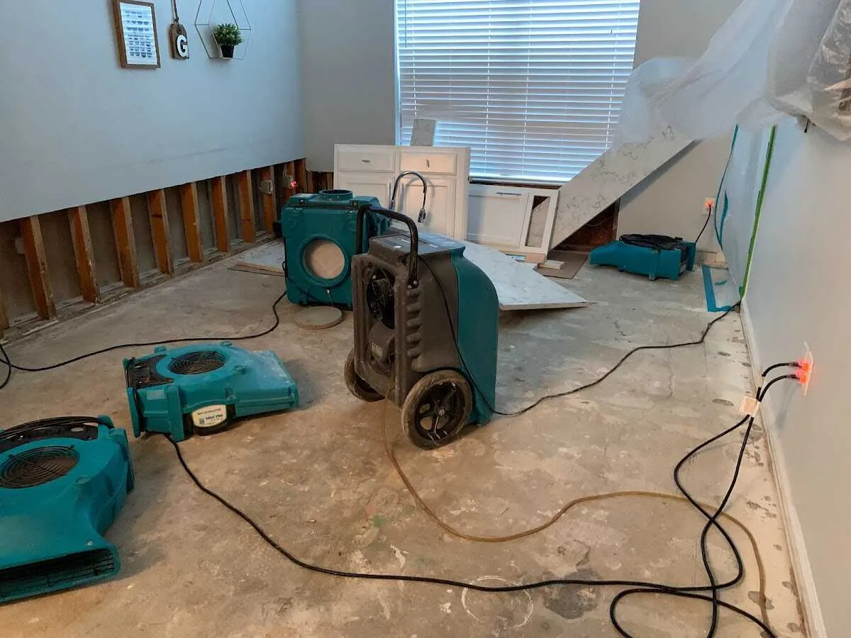 Dehumidifier in flood-cut room for Water Damage Restoration in Lake City